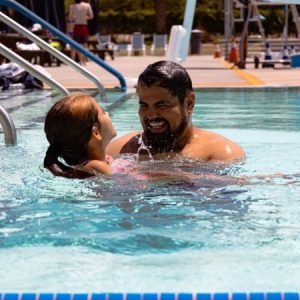 Recreational pool - A father and daughter enjoying the pool together.